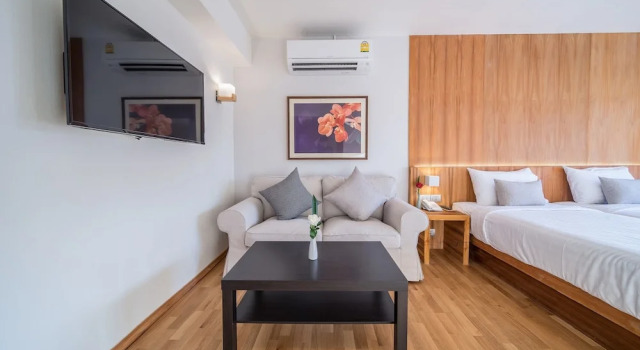 Четырёхместный семейный номер Standard с балконом Nuan Boutique Hotel