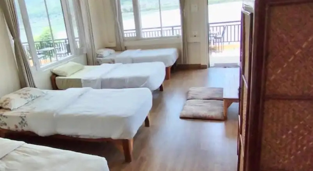 Кровать в общем номере Taalpaari Hotel