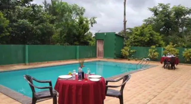 Palm Era Resorts, Prenota Hotel Hotel a Kushalnagar con parcheggio, Parcheggio