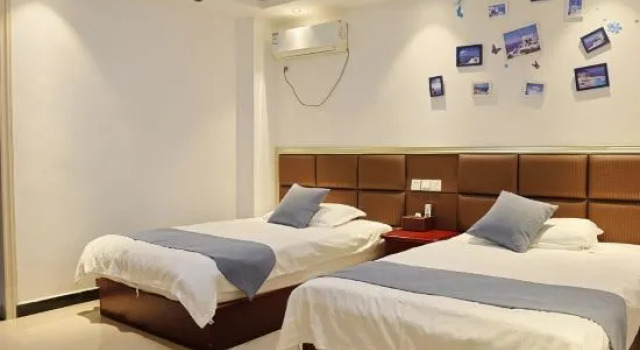 Letto in camerata Yixin Homestay