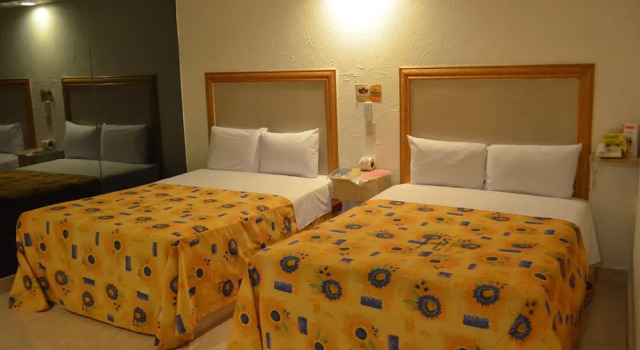Четырёхместный номер Economy Hotel Santa Cruz