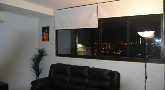 Highrise Windhoek apartment with skyline view, pool and gym
