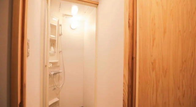 Кровать в общем номере Town Guide Hotel nirasakiyaSTAY