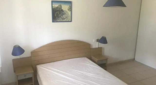 Кровать в общем номере с 3 комнатами с балконом Vacancéole - LAllée des Dunes - Ondres Plage