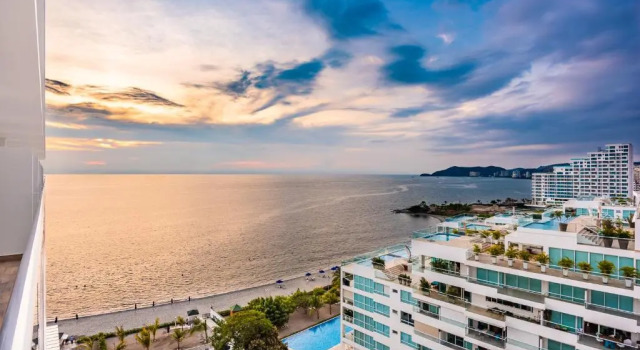 Четырёхместный номер Standard с балконом и с частичным видом на океан Santa Marta Marriott Resort Playa Dormida