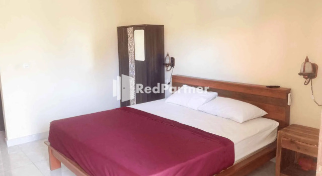 Santika Homestay Nusa Lembongan RedPartner, Забронировать Отель «постель и завтрак» Отели Лембонган с парковкой, рядом с Пляж Нуса Лембонган, Парковка