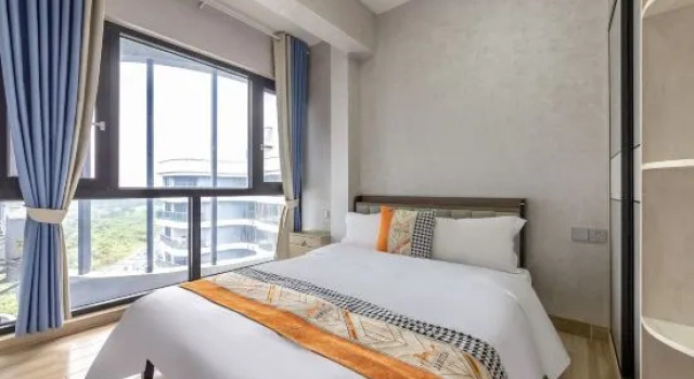 Люкс Guanjia Holiday Apartment (Haikou Mission Hills New Town Duty Free Shop)