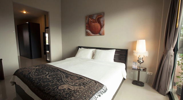 Кровать в общем номере Green Residence Hotel