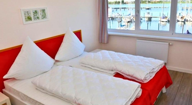 Ferienwohnung Am Yachthafen mit Balkon, Book Apartment Fehmarn Troms