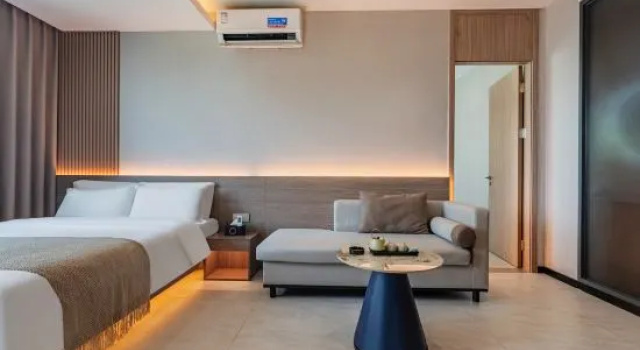 Семейный люкс Weimeijia Hotel (Provincial Government Riyue Square Duty Free Shop)