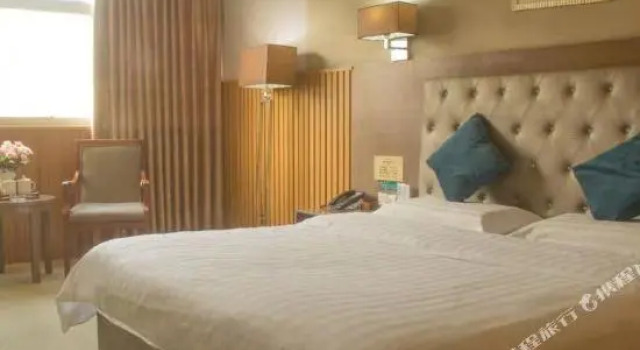 Xinqing Business Hotel
