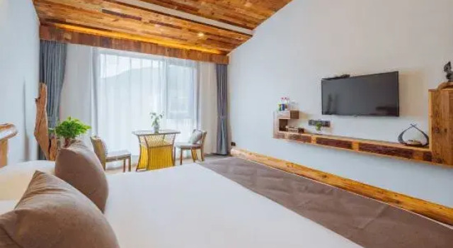 Кровать в общем номере Floral Hotel·Nanshan bamboo sea deep stream source root art people
