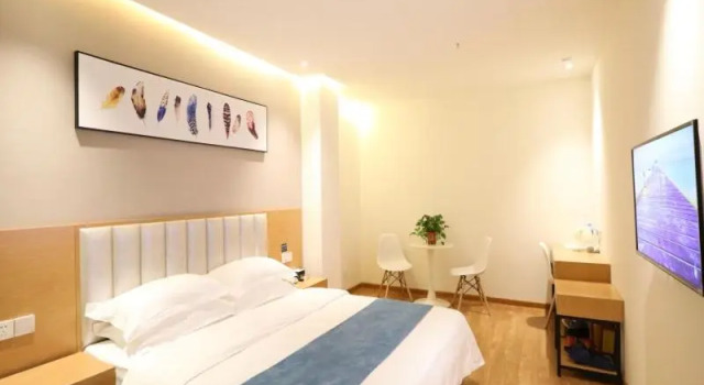 Shell Xinzheng Airport Port Huaxia Avenue Hotel, Rezerwuj Hotel Xinzheng Henan