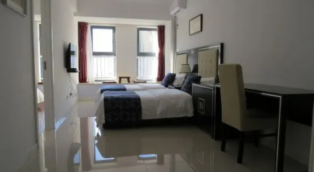 Люкс Deluxe Guan County Hong Pu Traders Hotel