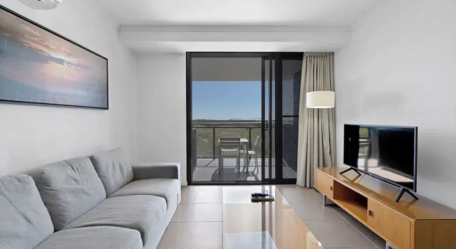 2 soveværelser i executive- lejlighed med altan Pacific Sands Apartments