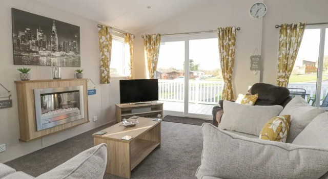 Stylish Lodge set in the Sand le Mere Holiday Park