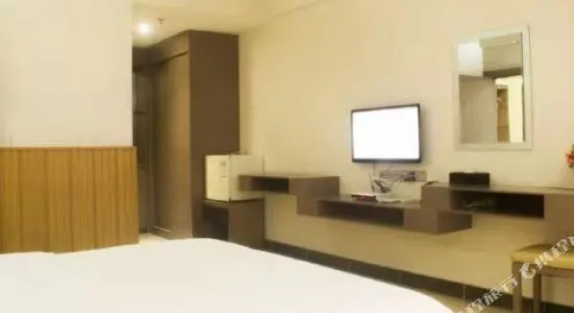 Xinqing Business Hotel