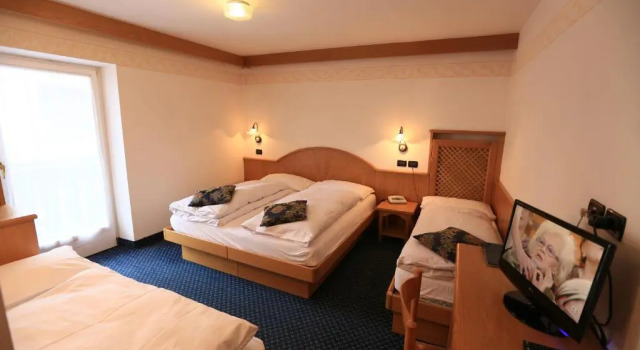 Четырёхместный номер Standard с балконом Appartamenti Arnica