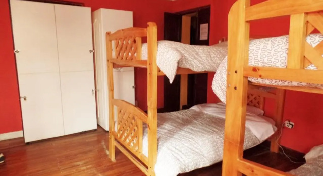 Кровать в общем номере Hostel Revolution Quito