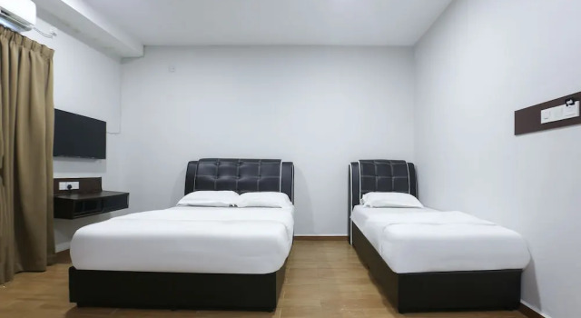 Номер Deluxe OYO 89859 PP Traveller's Hotel