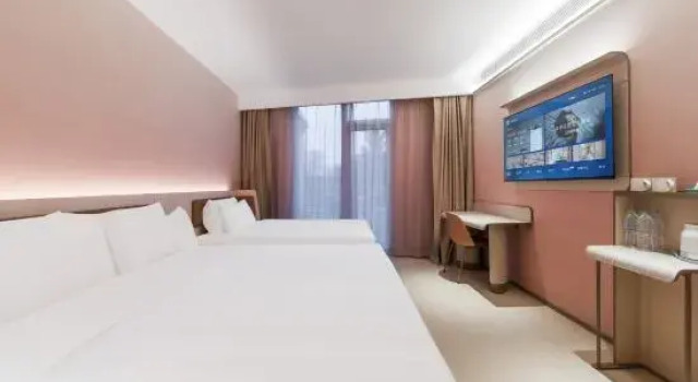 Люкс Deluxe HanTing Hotel (Qingdao Jinshatan Wuyue Square)