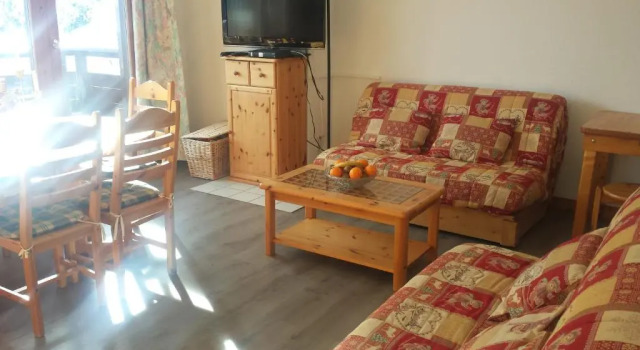 Апартаменты Appartement en résidence skis aux pieds avec sauna