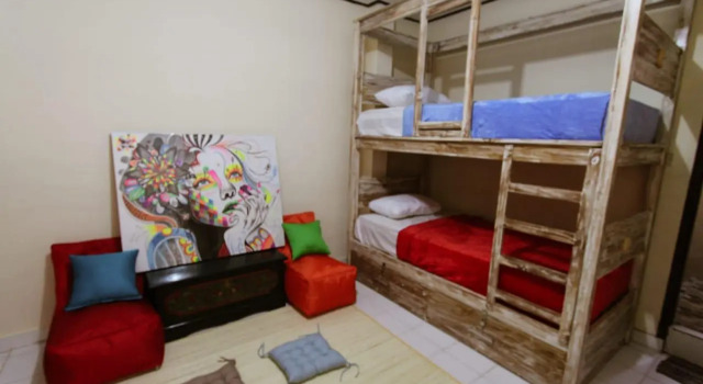 Łóżko w pokoju wieloosobowym Clamonic Guest House