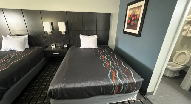 Deluxe Vierpersoonskamer met uitzicht Executive Inn