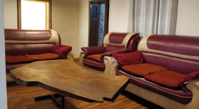 Кровать в общем номере Tulaja Boutique Hotel