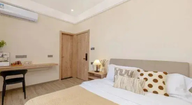 Qujing Xiaohuayuan Yiju Homestay, Prenota Hotel Qujing Yunnan