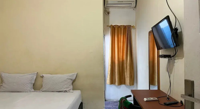 Номер Deluxe Capital O 94240 Asoka Syariah