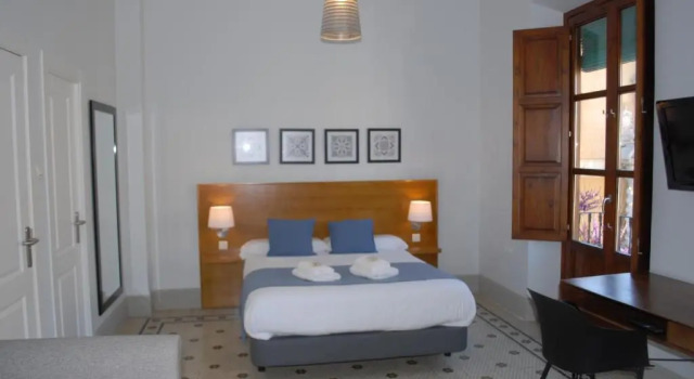 Четырёхместный номер Superior La Perla Granada Suites