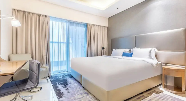 Апартаменты Grand Staycae Holiday Homes - Damac Towers By Paramount