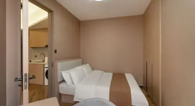 Люкс Business Nanjing Wanguan Smart Hotel (Pukou Wanhui City Subway Station Youth Olympic Sports Park Stadium)