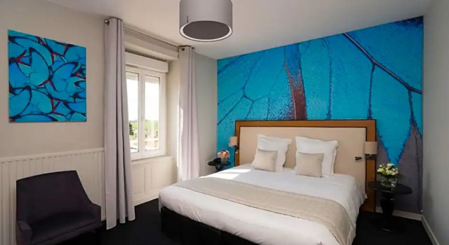 Номер Deluxe Logis Hôtel Le Tisseur des Saveurs