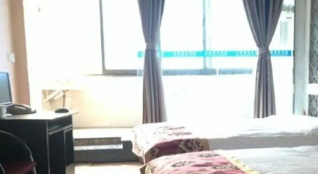Nei Jiang Kai Lian Business Inn, Prenota Hotel Neijiang Sichuan