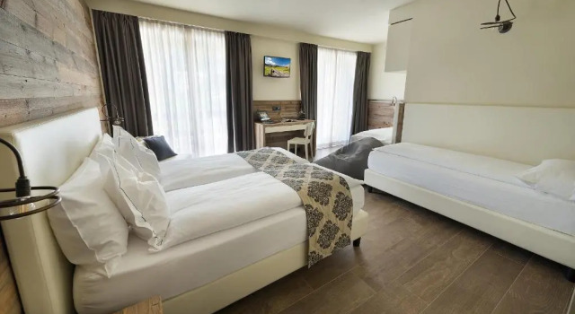 Четырёхместный номер Comfort Hotel Sporting Family Hospitality