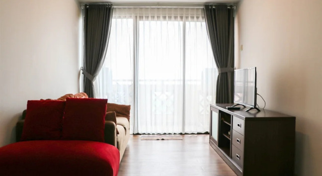 Апартаменты Cozy Living and Modern 2BR Puri Garden Apartment By Travelio