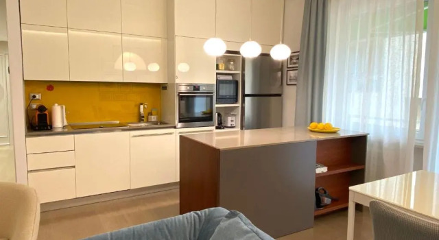 Апартаменты Appartamento incantevole con posto auto riservato-Clic House