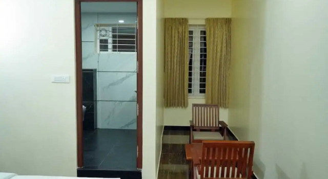 Номер Deluxe HOTEL NIVETHA INN