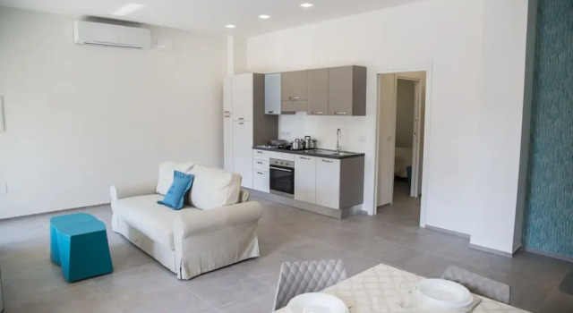 Апартаменты Comfort Rivabella Suite Apartments