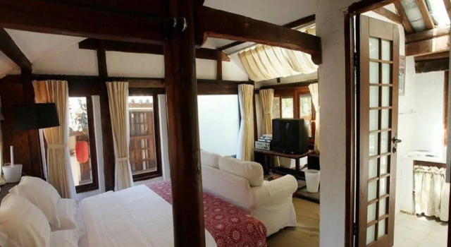 Lijiang Shu He Huanxi Inn, Забронировать Отель Лицзян Юньнань, рядом с Улица Сквер-стрит Древнего города Даянь
