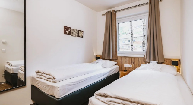 Люкс с 2 комнатами с балконом AvenidA Mountain Lodges Kaprun