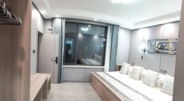 Кровать в общем номере Mohe Shancheng Xiaoyuan Homestay (Beiji Village)