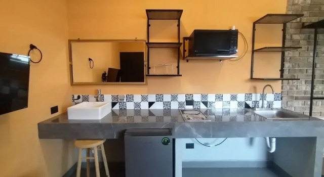 Номер Executive Estudios amueblados y equipados con cocineta en ubicación Céntrica MTY