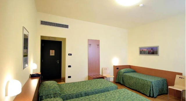 Standard- firedobbelt værelse Dama Hotel