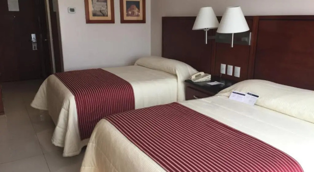 Четырёхместный номер Executive Hotel Fortin Plaza