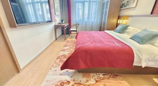 Люкс Qianna Hotel （Jiyuan Railway Station Jigang）