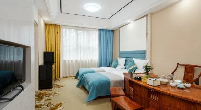 Семейный люкс Dujiangyan Huaxi Hotel