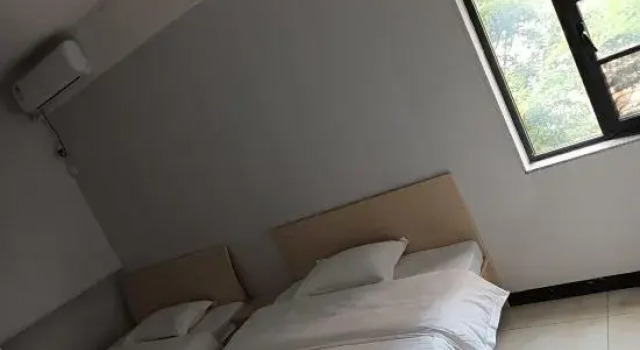 Семейный люкс Xinhai Hotel